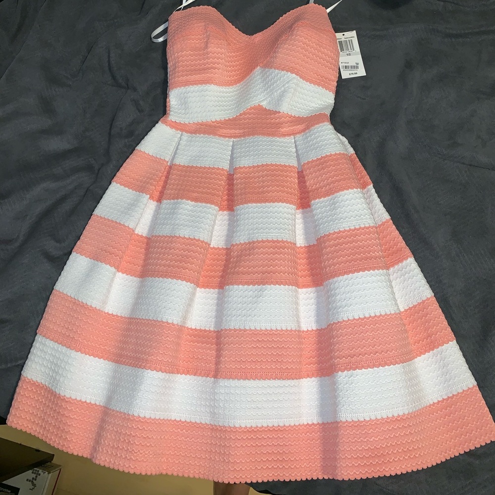 Pink and white strapless dress